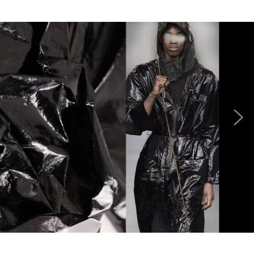 Super bright black DuPont paper coated dyed cloth washed waterproof creative fabric