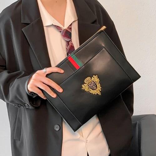 Tidog korea Hand in hand with a bag for the new fashion youth clutch bag