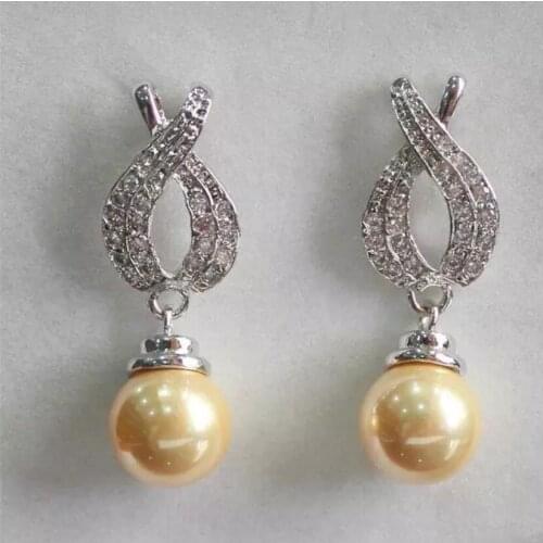 Fashionable feminine temperament yellow Shell Pearl Earrings