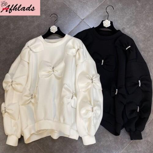 Autumn New Womens Diamond Bow Loose Long Sleeved Round Neck Solid Color Fashion High Quality Large Size White Tops Women