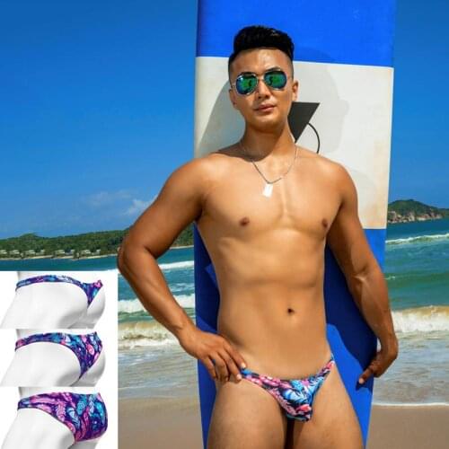 Sexy tight low waist half pack hip thong swimwear men bikini swim briefs swimsuits surf swim trunks different penis pouch size
