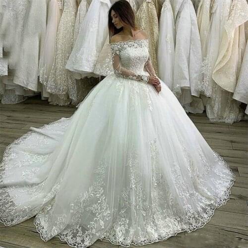 Luxury castle princess Ball Gown White Wedding Dresses Long Sleeve Lace Applique Boat Neck Bridal Dress Customized Wedding Gowns