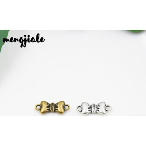 MENGJIALE 50pcs/lot Antique silver Tone Bow Tie connector Charms for Jewelry Accessories Making 19*8mm