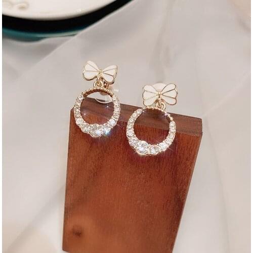 Ins ring bow earrings female simple and compact fashion earrings Korean style temperament wild earrings elegant exquisite