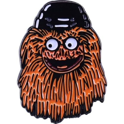 Cute Gritty enamel pin furry orange creature with googly eyes pin