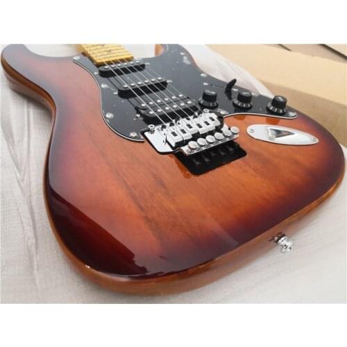 Free shipping custom 6 string sunburst guitar,mahogany body,ssh pickups,tremolo bridge,black pickguard,yellow neck