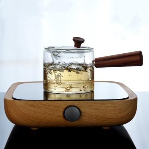 Glass boiling teapot thick heat-resistant glass kettle side handle flower teapot Kung Fu tea set