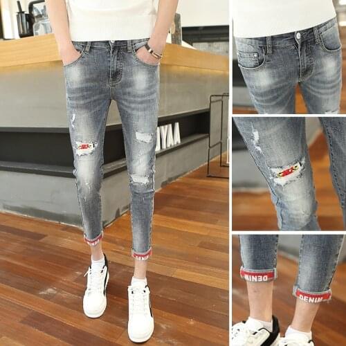 Denim Jeans mens 2021 spring autumn Slim feet Korean elastic ripped hole casual trendy teenagers cropped pencil pants