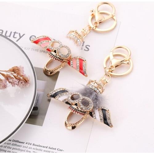 New Small Hair Ball Crown Skull Wings Metal Keychain Creative Funny Back Hollow Car Bag Car Key Pendant Halloween Gift