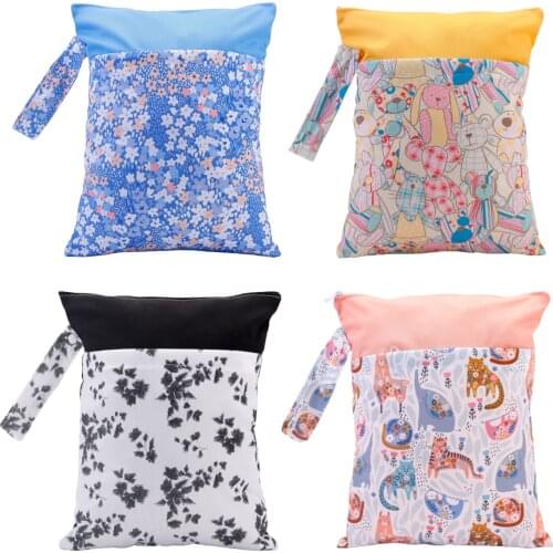 [simfamily] 36*28CM Wet Bag Waterproof Printed Baby Diaper Bag Double Pocket Cloth Handle Cartoon diaper bag Mummy bag