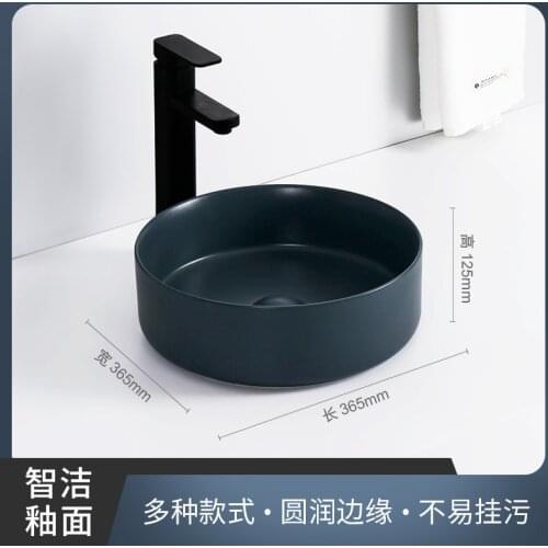 Simple black ceramic round household bathroom small above counter basin hotel bathroom ceramic washbasin with faucet