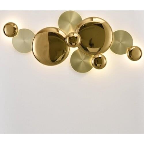 Light luxury noble electroplated gold creative electroplated gold metal disc combination of postmodern living room background wa