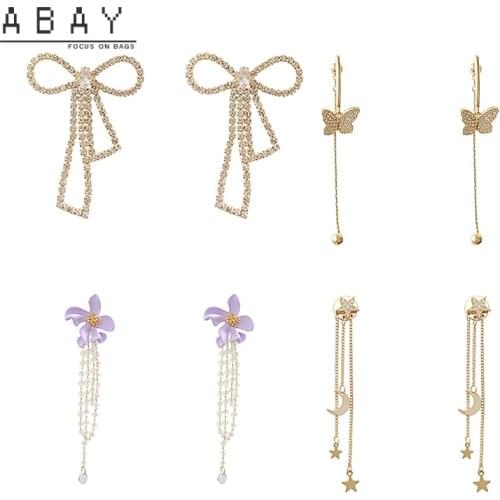 S925 Silver Needle Micro Inlaid Zircon Flower Ear Pendant Female 2020 New Long Butterfly Pearl Tassel Design Sense Earrings