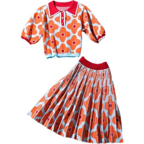 Summer breasted lapel puff sleeve knitted shirt + high waist bag hip pleated skirt knitted two-piece suit women