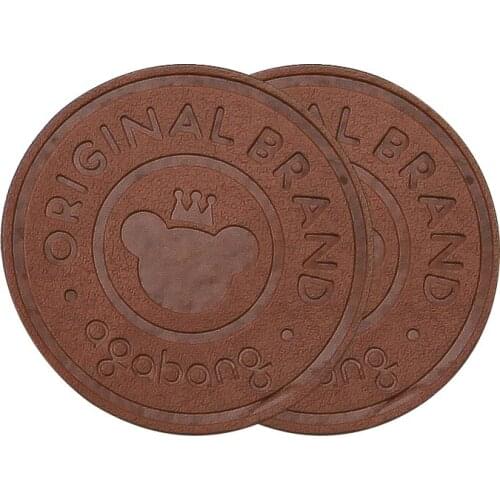 Custom Round Pu Leather Labels For Clothing Brand Logo Stitched Tags Custom Embossed Name Sew Leather Garment Tag For Backpack