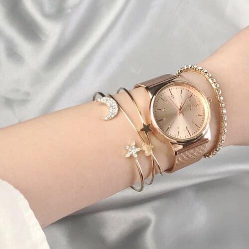 Pack Of 4 bangle bracelet with stretch rhinestones and star/ moon inlay rhinestone design in burnished