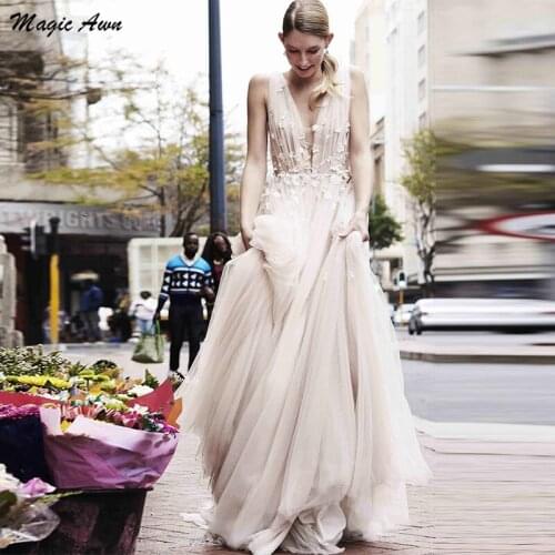 Magic Awn Bohemian 2021 Wedding Dresses Flowers Appliques Tulle V-Neck Backless Beach A-Line Marige Gowns Abito Da Sposa