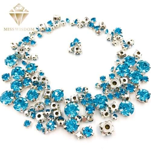 Hot sale Garment beads 100pcs/pack Mixed size Lake blue glass crystal sliver base sew on rhinestones diy clothing accessories