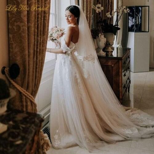 2020 Country Style Wedding Dresses Sweetheart Sleeveless 3D Lace Appliques Tulle Garden Bridal Gowns with Straps