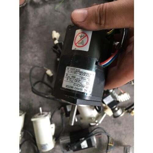 SGM-A5A312 SERVO MOTOR , used in good condition . 80% appearance new , good working , free shipping
