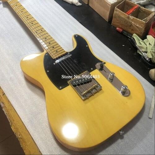 High quality electric guitar. Pale yellow paint, copper string column, round socket, free delivery