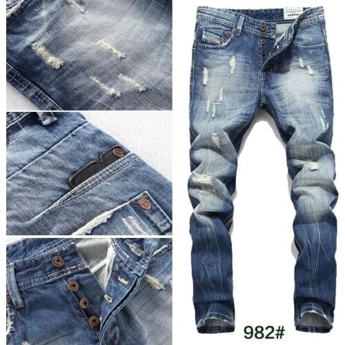 2017 Europe and the United States Mens Straight Self-cultivation Scraping Casual Pants Youth Hole Jeans Large Yards