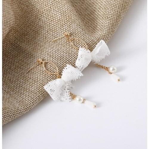 Korean version of the new fashion jewelry bow earrings gem tassels sweet bohemian earrings womens quality long earrings