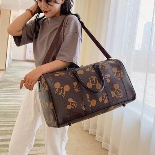 Disney Mickey Mouse outdoor travel hiking cute bag men and women boarding bag large-capacity one-shoulder messenger bag