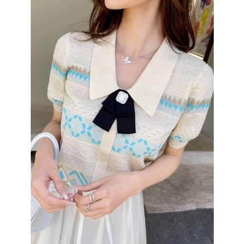 Knitted T-shirt with short sleeves jacket female temperament of summer new joker hollow-out French gentle wind the brief paragra