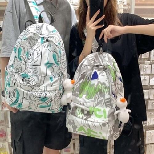 Backpack female 2021 new Korean fashion personality graffiti ins wind couple large-capacity travel student schoolbag mochila