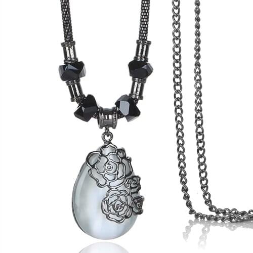 FYJS Unique Jewelry Gun Black Plated Decorative Pattern Wrap Water Drop Pendant Cat Eye Stone Necklace