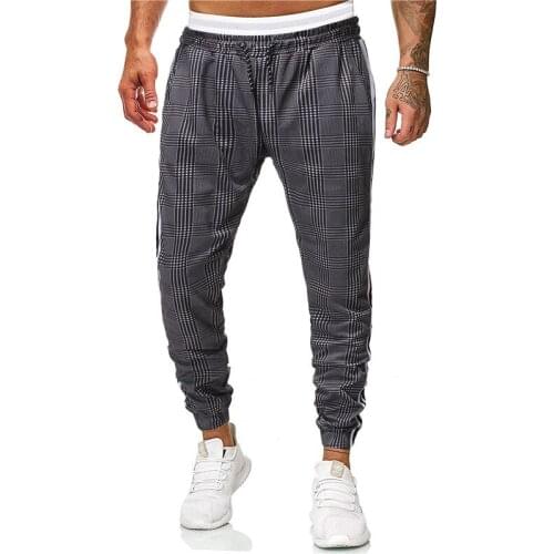 Casual pants men sport trousers printing plaid pants Streetwear loose stripe sweatpants men Hip hop joggers mens harem pants