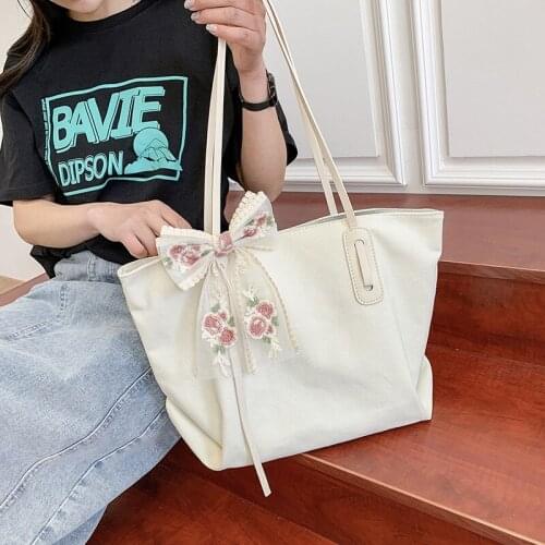 Korean style simple commuter tote bag canvas bag womens bag ins wind shoulder bag large capacity handbag underarm bag