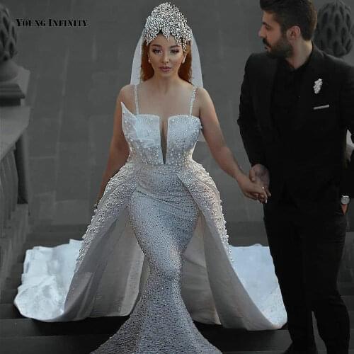 In Fashion Mermaid Wedding Dresses 2021 Sleeveless Bridal Gown Backless V Neck Royal Train Beaded Pearls White Plus Size Bride