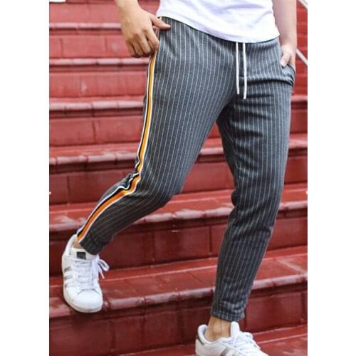 Muscle brothers 2019 new mens contrast color striped pants knitted slim pants
