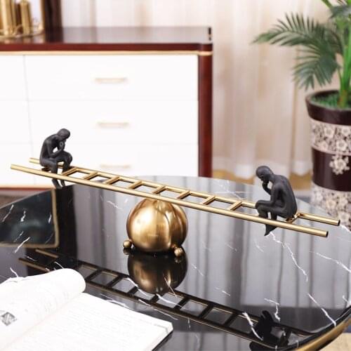 ABSTRACT BLACK CHARACTER SITTING ON A METAL BALANCE LADDER HOME DECOR ACCESSORIES FIGURINE LIVING ROOM ORNAMENT OFFICE GIFTS