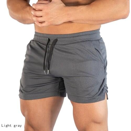 2020 new summer solid color mesh compression quick-drying shorts mens water sports surfing swimming shorts