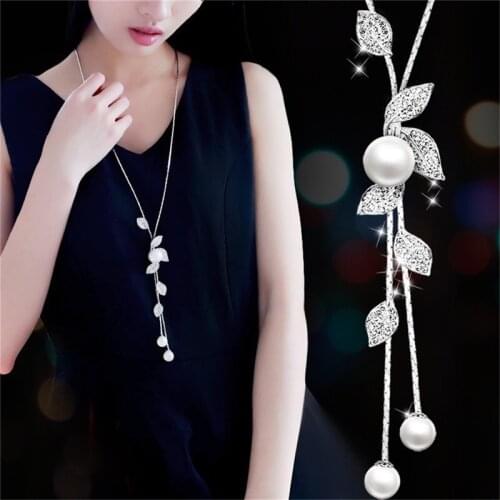 Korean Fashion Rhinestone Leaf Leaf Pearl Long Necklace Clavicle Chain Sweater Chain Wholesale Womens Jewelry