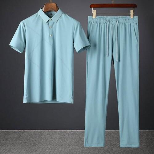 2021 summer high end hollowed out technology pressure rubber Lapel two piece set light luxury ice silk mens leisure sports suit