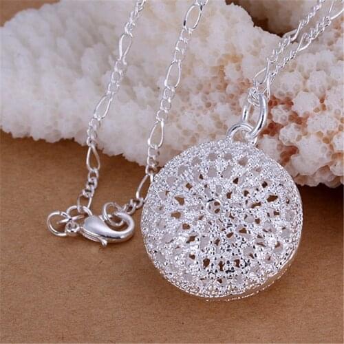 Promotions Free shipping Beautiful fashion silver color jewelry charm retro hollow round pendant pretty Necklace P136 Kinsle