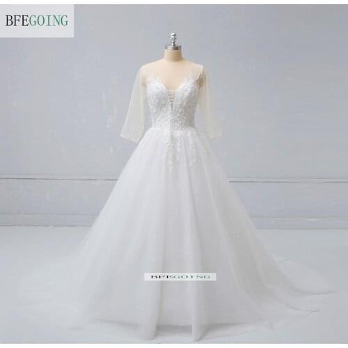 Luxurious Ivory Tulle Lace Appliques Beading 3/4 Sleeves Floor-Length Ball gown Wedding dress Chapel Train Custom made