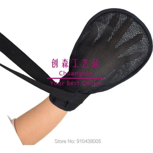 Elderly lying in bed for the tube drawing against scratching wrist fixed constraint with constraint gloves