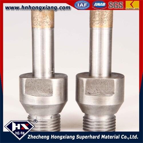 Drilling holes with sintered 36mm diamond thread shank drill bit