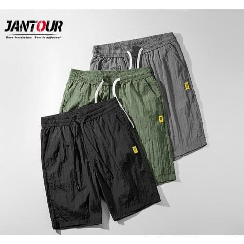 Jantour Mens Casual Breathable work Pants Pockets Beach Solid Color Sport Shorts Mens Short Jogger Shorts Pant With Pocket