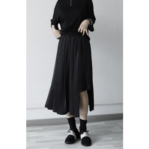 Summer 2021 new design sense small irregular A-shaped pleated half skirt high waist elastic waist medium long skirt