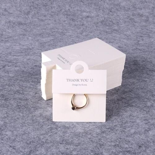2021 New Jewelry Display 100Pcs/Lot 6x6cm White Finger Ring Card Paper Spherical Earring Hoop Packaging Cards Smile Pattern