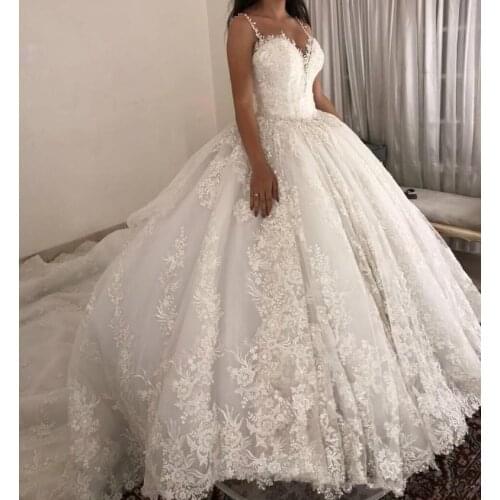 Luxury Princess Ball Gown Wedding Dress Spaghetti Strap Lace Appliques Bridal Gowns Sweep Train Custom Made Chapel