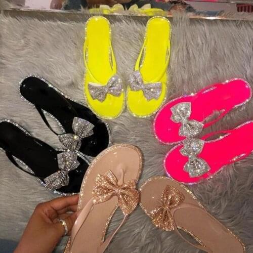 Hot Sale 2020 Factory direct women rhinestone bow sandals 2020 PVC fashion wild flip flop flat beach slippers