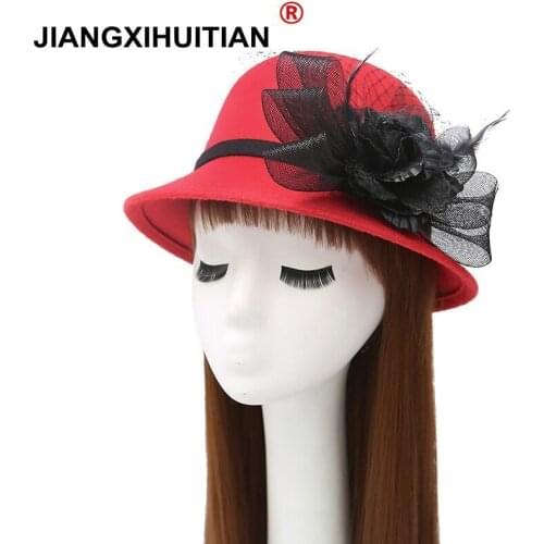 2017 Winter women has Christmas giftKeep warm fashion felt has youthcloche hat Super warmth with handmade flower free shippng