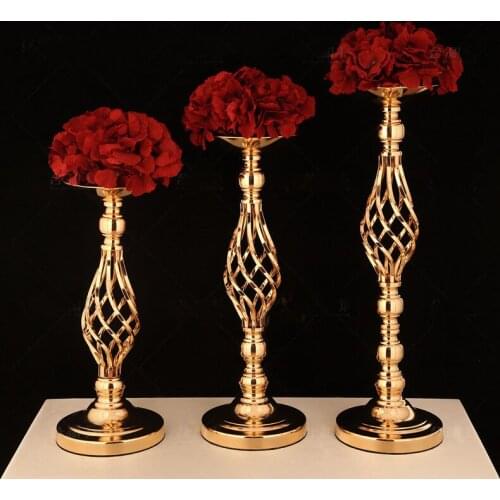 Wrought iron candlestick hollow artificial flower stand European romantic creative ornaments wedding props candlestick road lead